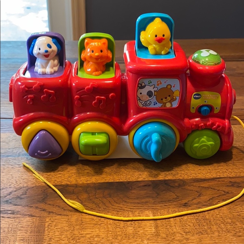 Vtech roll & surprise animal train.